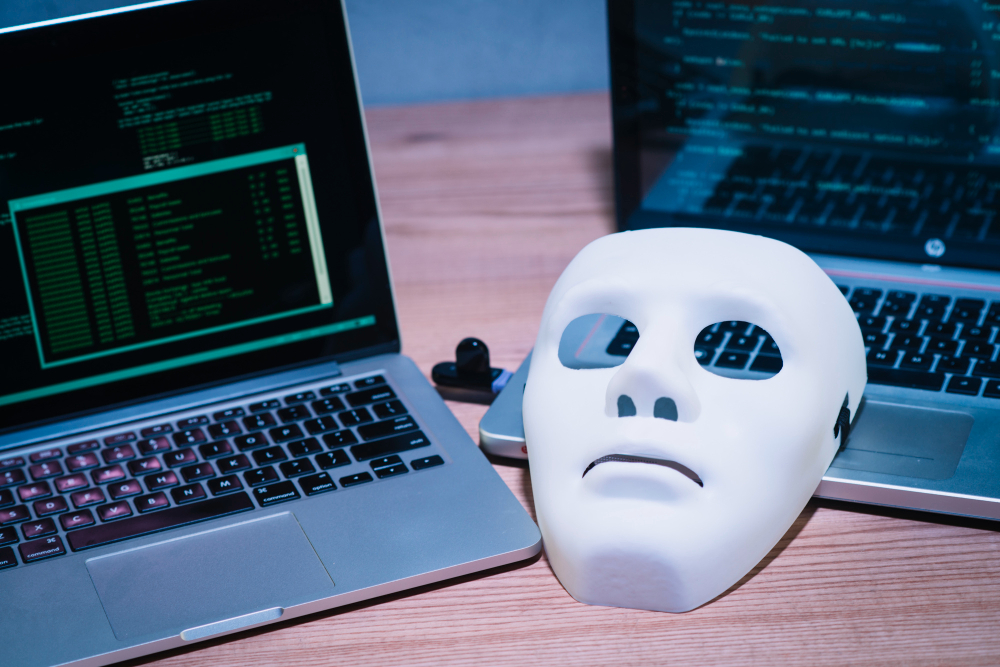 Ethical hacking concept with white mask and computer screens displaying code
